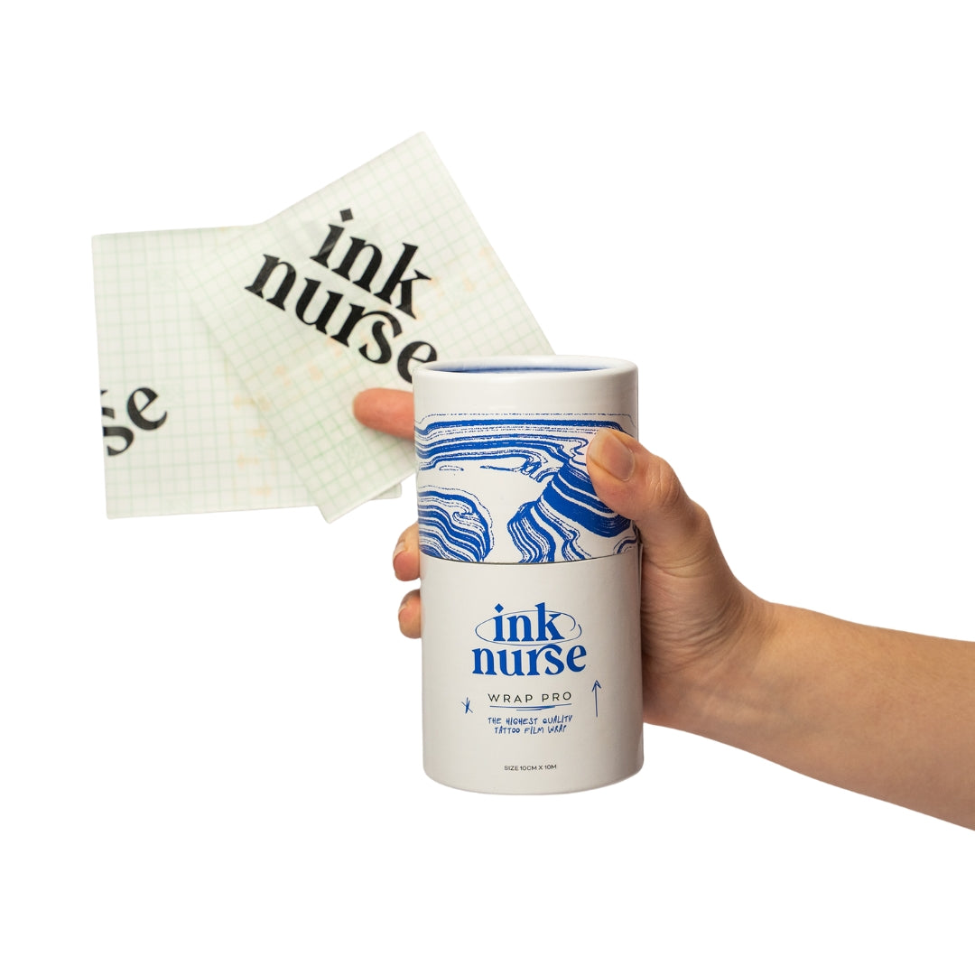 Hand holding an 'ink nurse' tattoo film wrap protective second skin product with 2 free squares in the background